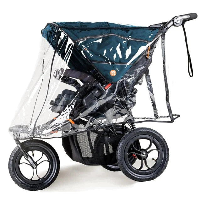 Baby stroller with a clear rain cover on a white background