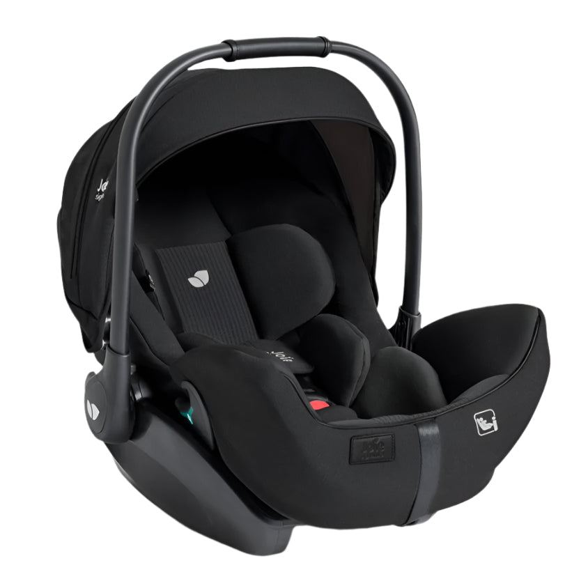 A black infant car seat with a matching canopy and harness, shown from a three-quarter angle on a solid white background.