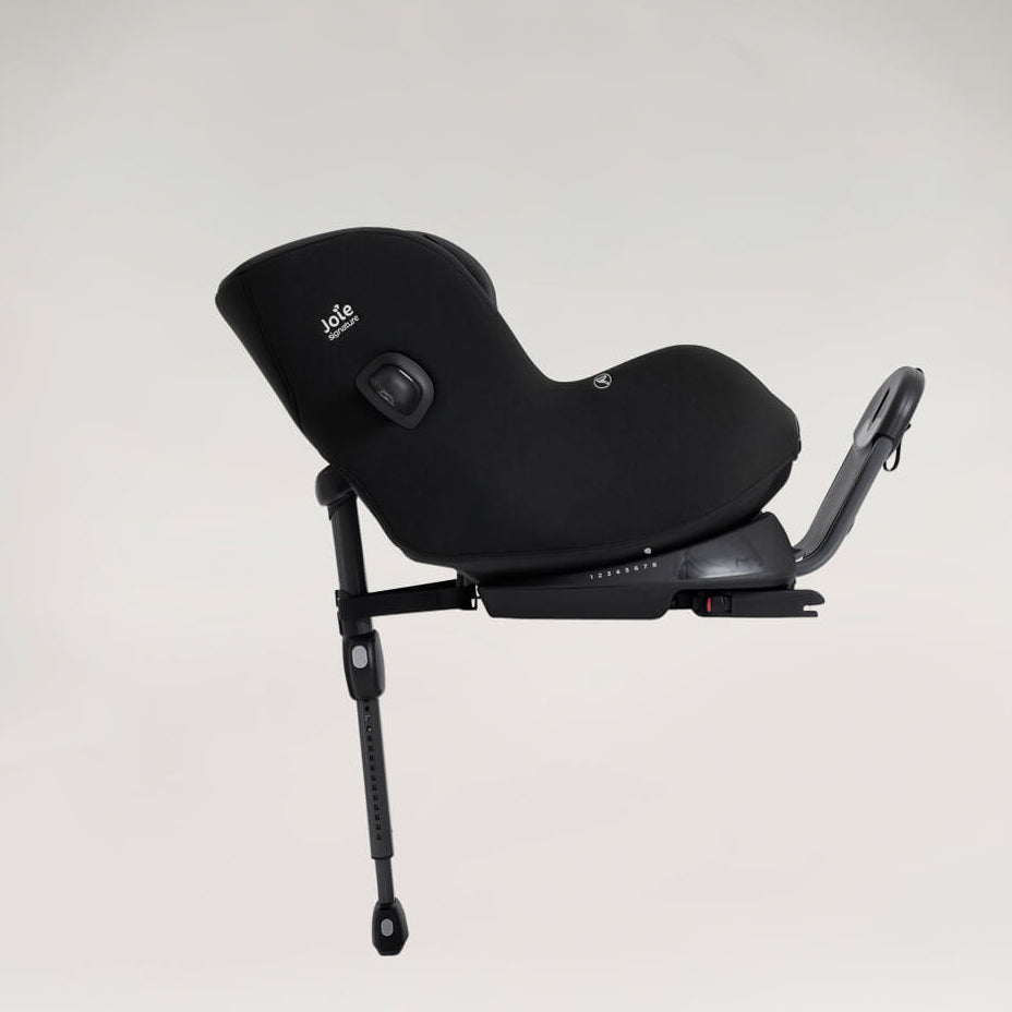 Black baby car seat on a light gray background