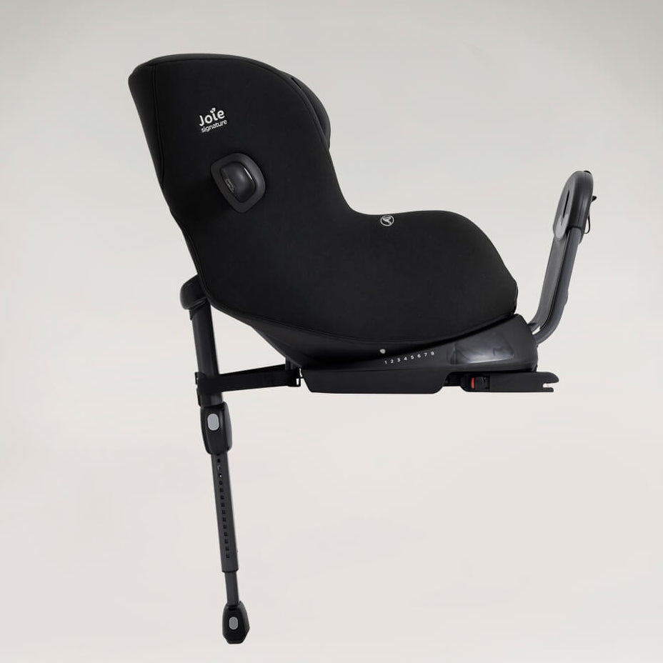 Black car seat with a visible brand logo on a light gray background