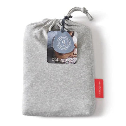 A light heather gray drawstring pouch with a hanging product tag and a small red side label, photographed on a clean white background.
