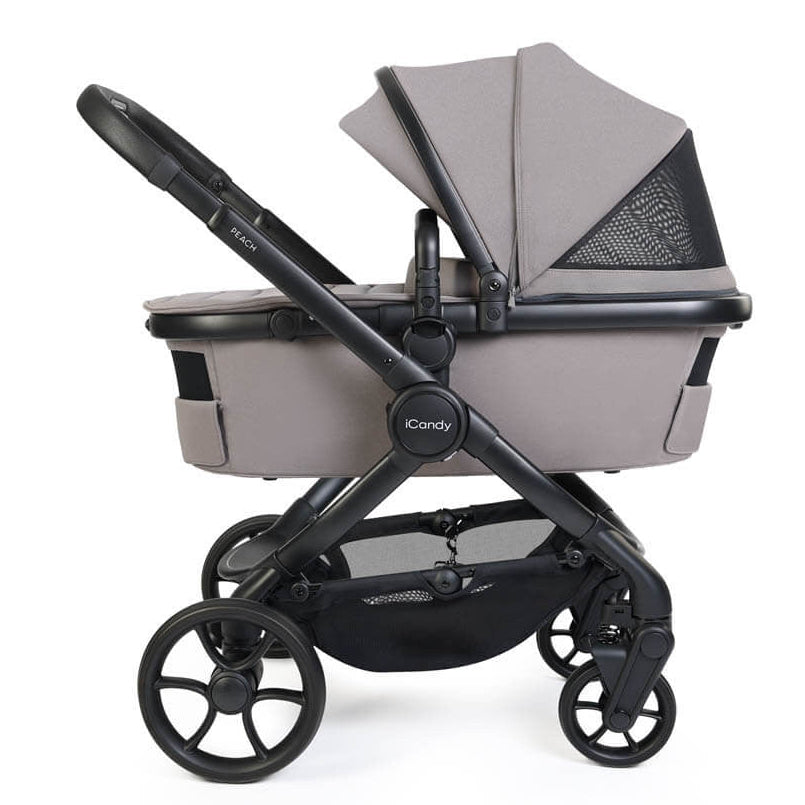Gray and black baby stroller on a white background