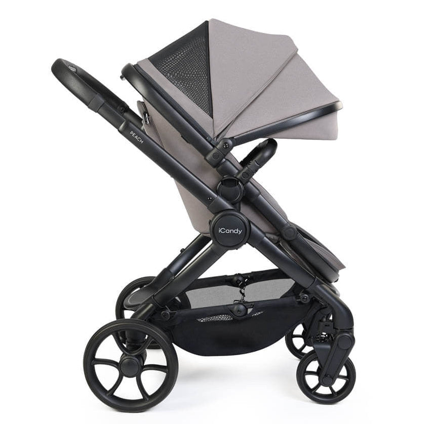 Black and gray stroller on a white background