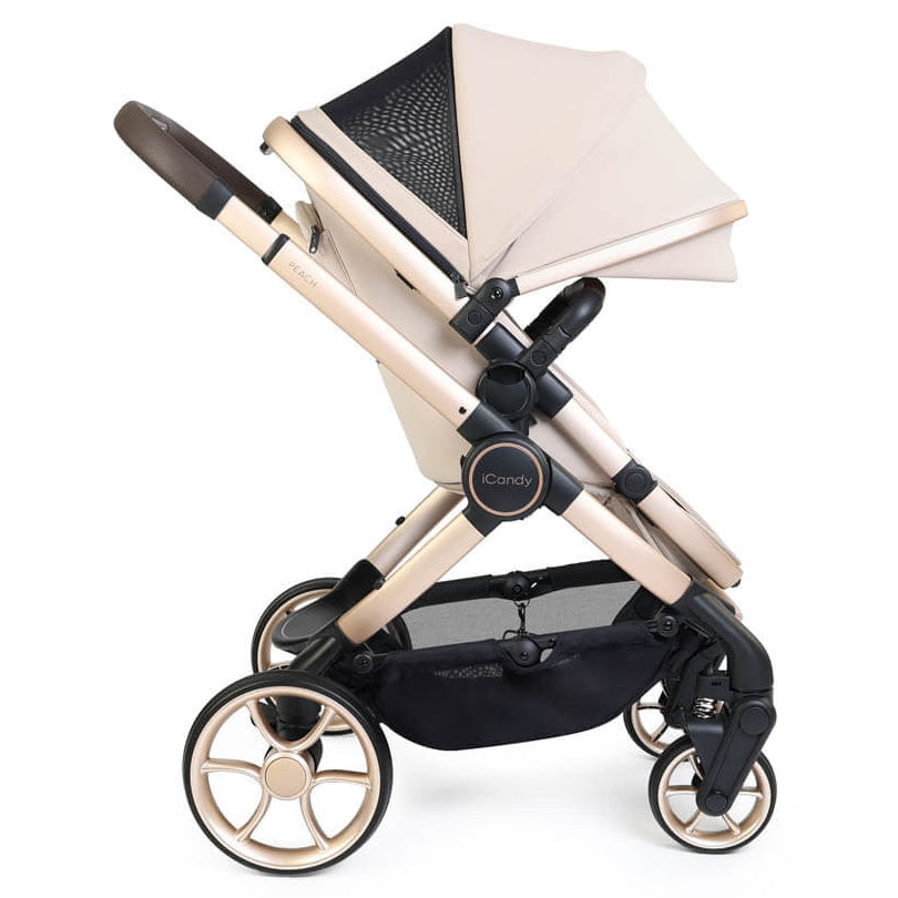 Beige and black baby stroller on a white background