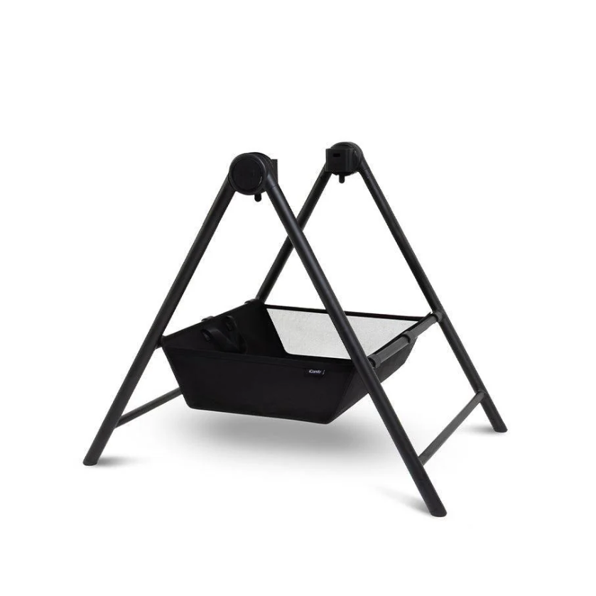 Black metal swing set on a white background