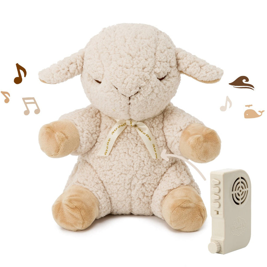Plush lamb toy with sound module on a white background