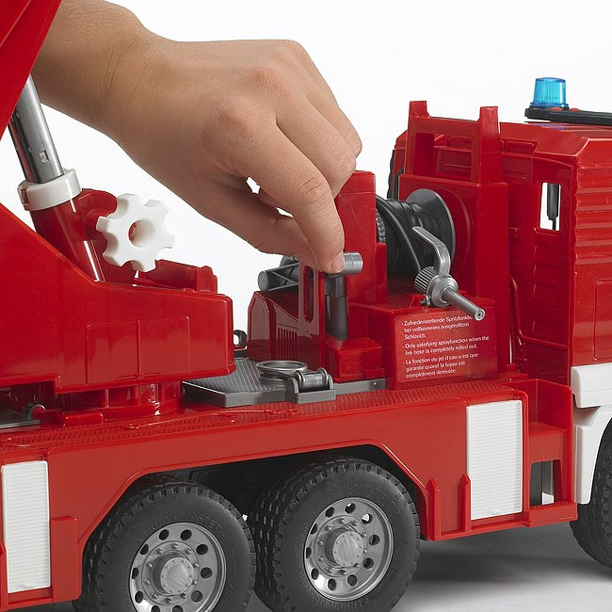 Bruder MAN Fire Engine Toy Truck with Water Pump, Lights and Sound Module