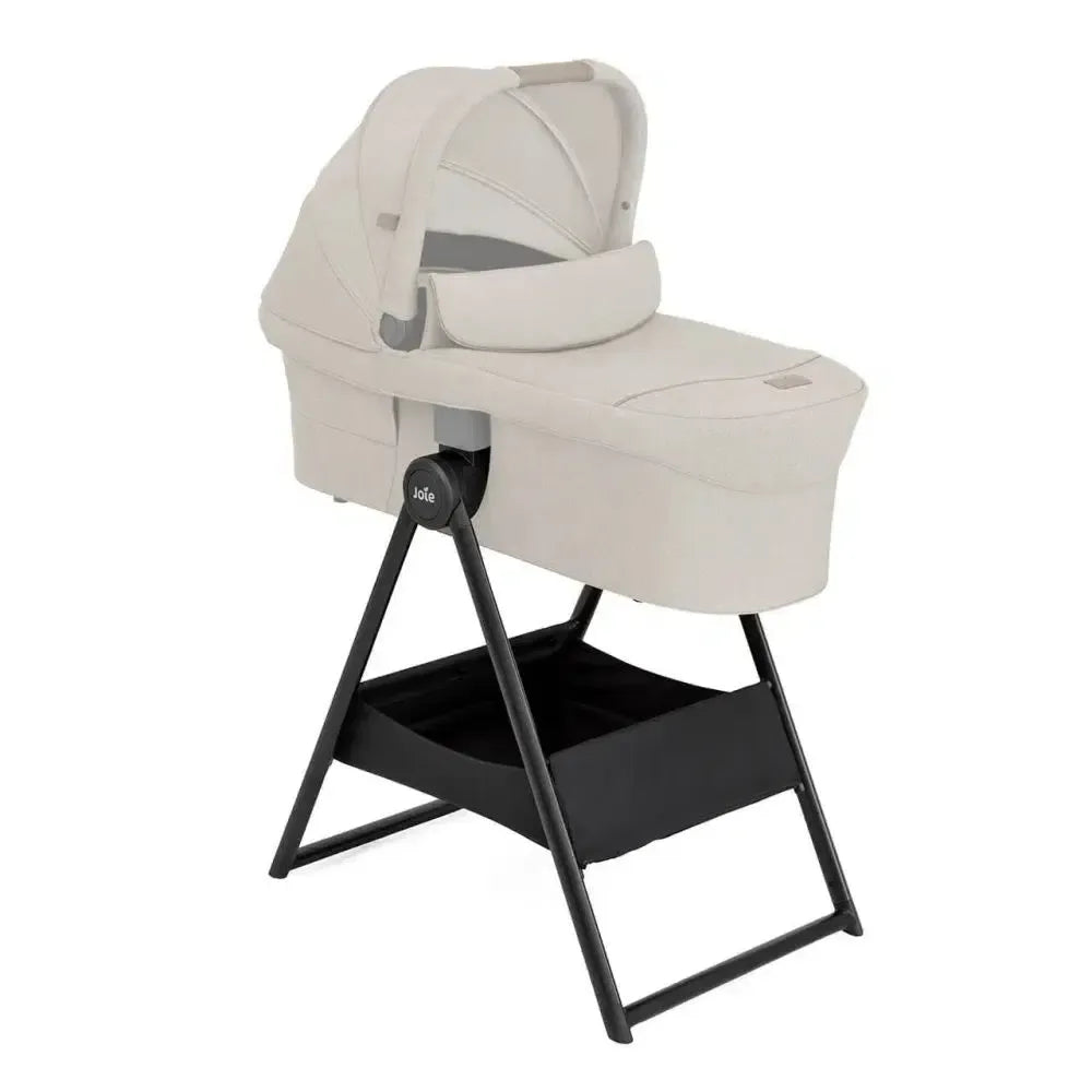 Baby bassinet with stand on a white background