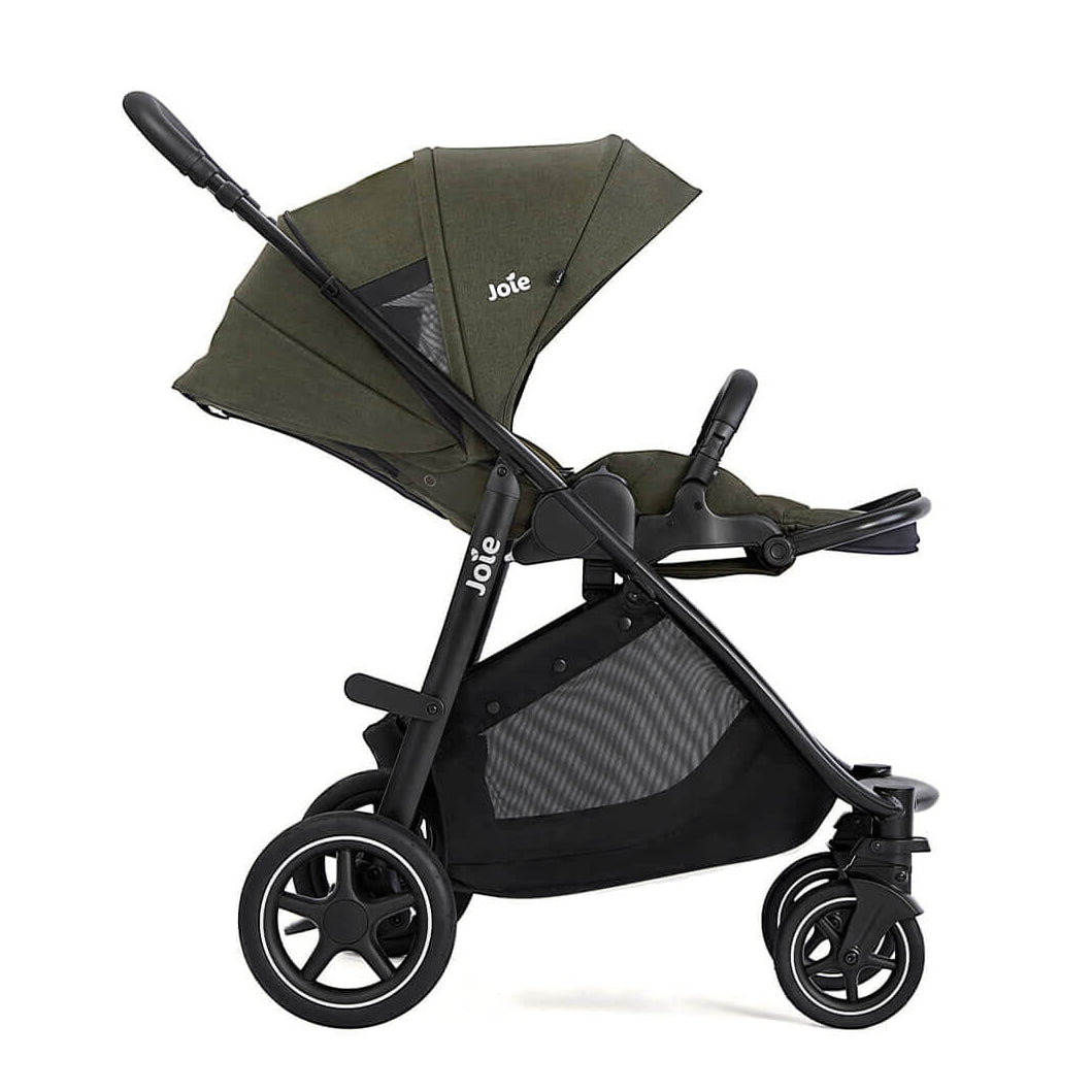 Green and black stroller with Joie branding on a white background