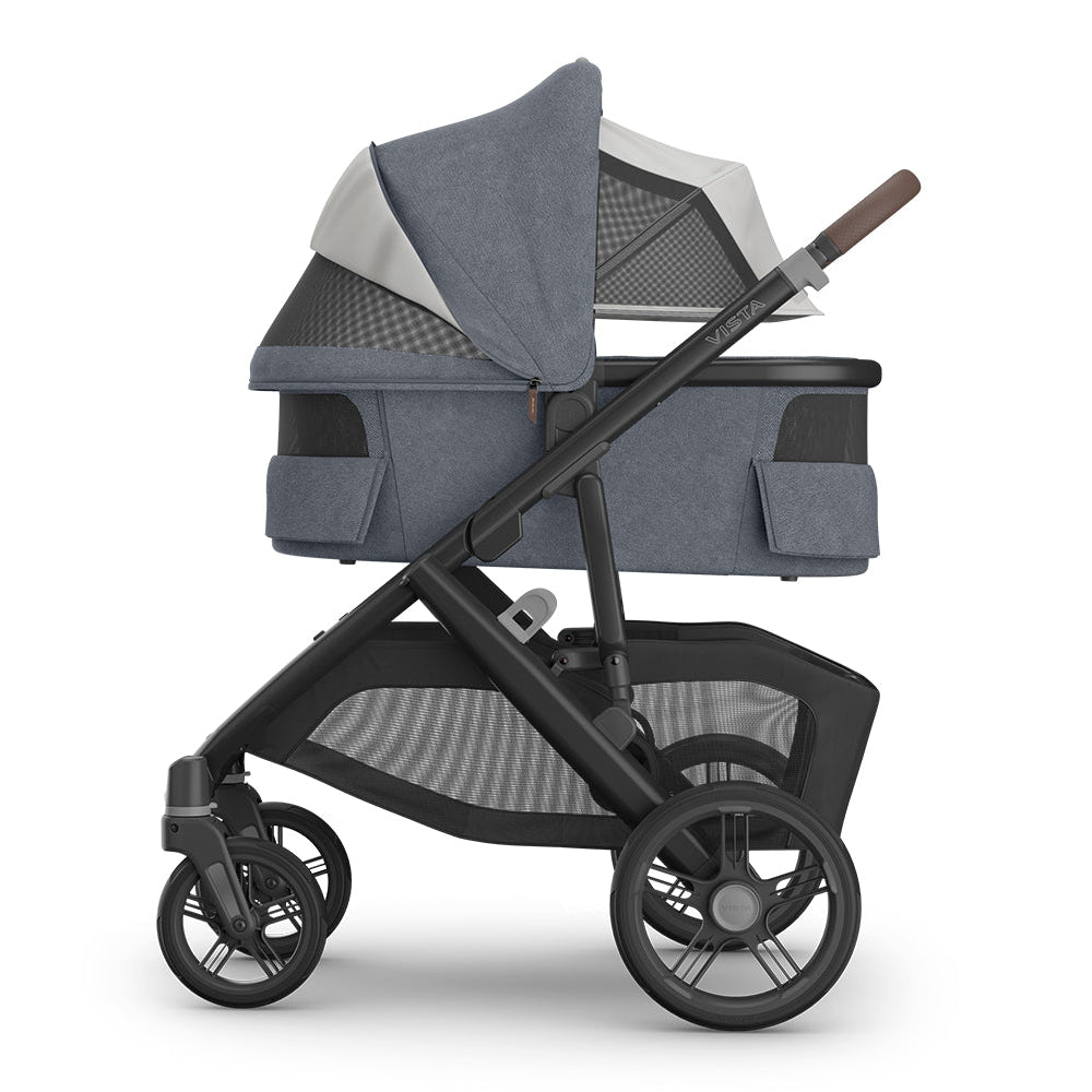 Blue and black stroller on a white background