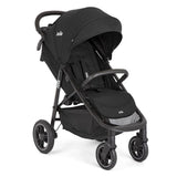 A black Joie Litetrax PRO pushchair with all-wheel suspension and foam-filled rubber tyres, featuring a luxurious leatherette handle and a large shopping basket.