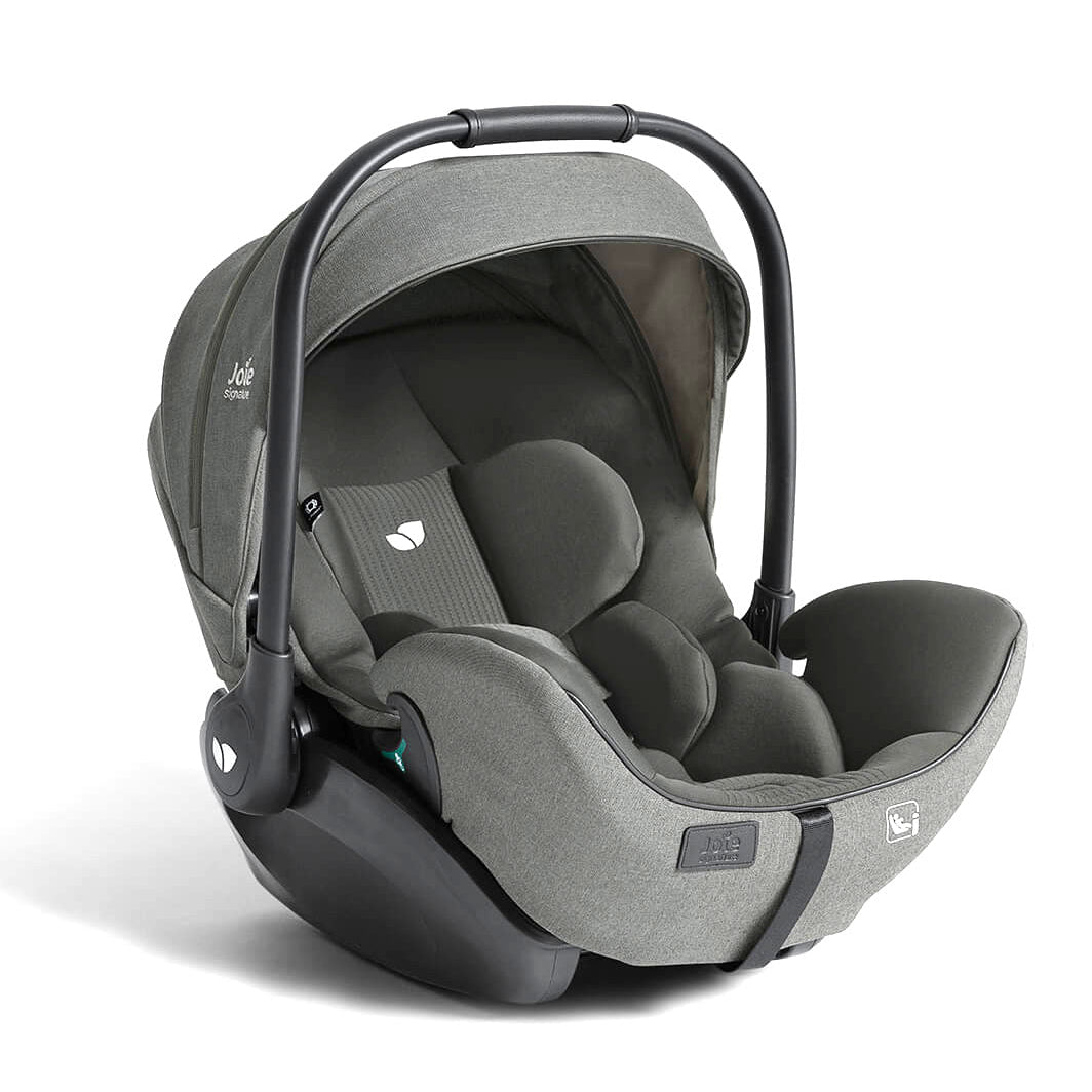 A baby car seat in a two-tone gray colorway, featuring a heathered medium gray fabric exterior and a dark charcoal gray interior, complete with a black handle and base, shown on a white background.