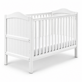 White wooden toddler bed with a slatted guard rail and arched headboard, shown on a clean white background.