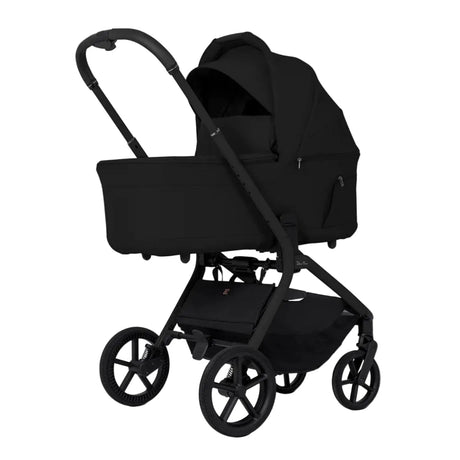 Black baby stroller on a white background