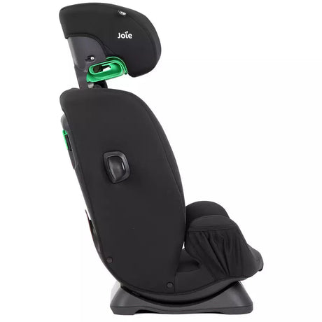 Black car seat with green accents on a white background