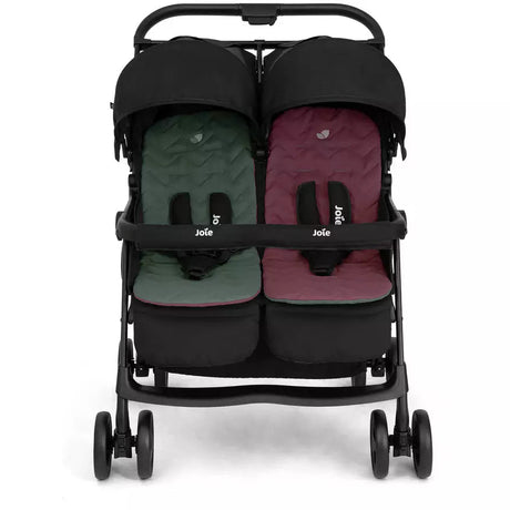 A double stroller with a black frame and canopy, featuring two separate seats with quilted cushions in dark green and burgundy, shown against a plain white background.