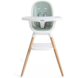 A Joie high chair with a mint green and white seat, white tray, and light natural wood legs, shown against a plain white background.