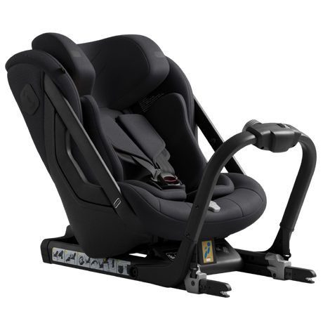 Black car seat with adjustable harness on a white background