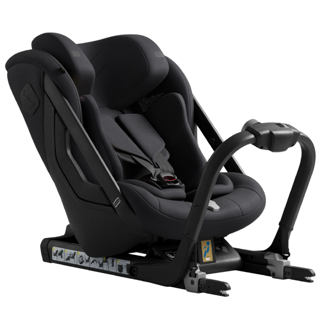 Black car seat with adjustable harness on a white background