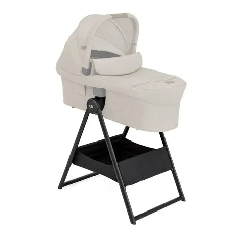 Baby bassinet with stand on a white background