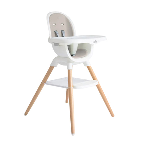 White high chair with wooden legs on a white background
