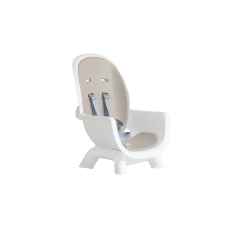 Modern high chair with a white base and beige backrest on a white background
