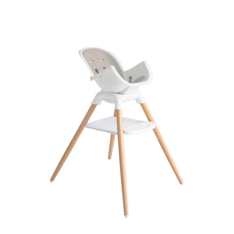 White high chair with wooden legs on a white background