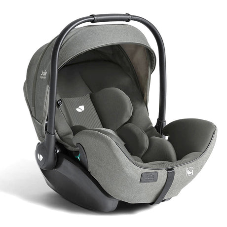 A baby car seat in a two-tone gray colorway, featuring a heathered medium gray fabric exterior and a dark charcoal gray interior, complete with a black handle and base, shown on a white background.