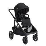 A black baby stroller and car seat combo with a matching black canopy, shown from a three-quarter angle on a solid white background.