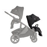Gray stroller with black car seat attachment on a white background