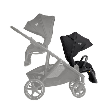 Gray stroller with black car seat attachment on a white background