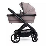 Baby stroller with beige canopy on a white background