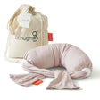 Pink neck pillow with drawstring bag on a white background