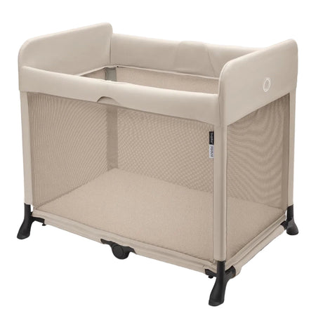 Beige baby playpen on a white background