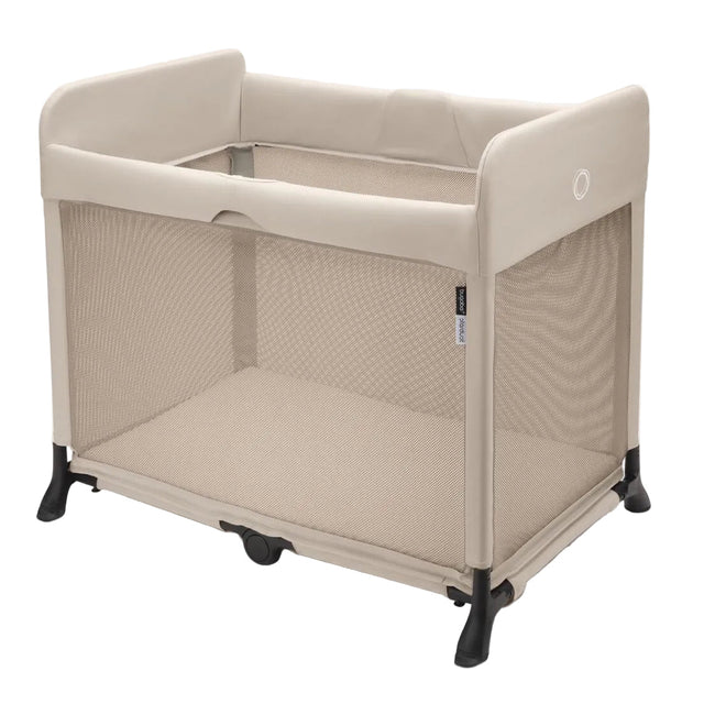 Beige baby playpen on a white background