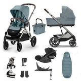 A multi-item baby travel system set displayed on a clean white background, including a stroller, bassinet, car seat, footmuff, shoe, and accessories.