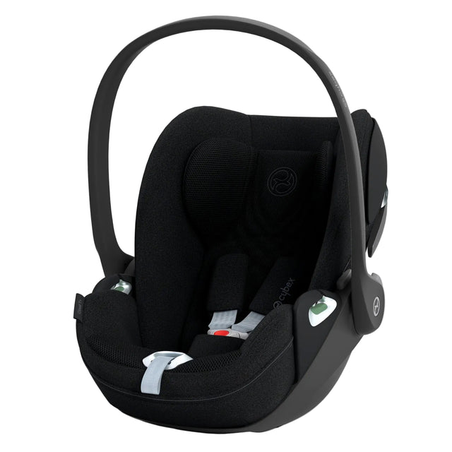 Black baby car seat on a white background