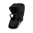 Black baby car seat with canopy on a white background
