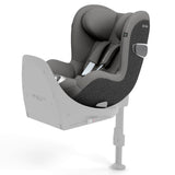 A grey and black baby car seat mounted on a light grey base, shown from a three-quarters angle against a solid white background.