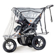 A clear vinyl stroller rain cover with a black frame and handle, shown fitted over a black stroller on a white studio background.