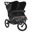 Black double stroller with orange accents on a white background