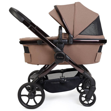 Brown baby stroller with black accents on a white background